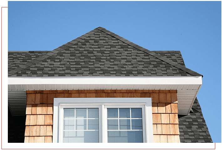 A house with two windows and a roof.