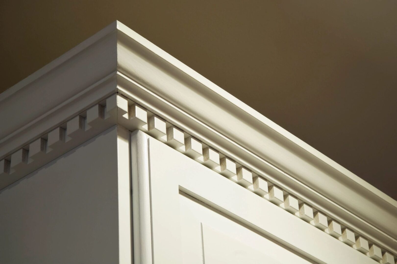 A close up of the corner of a cabinet